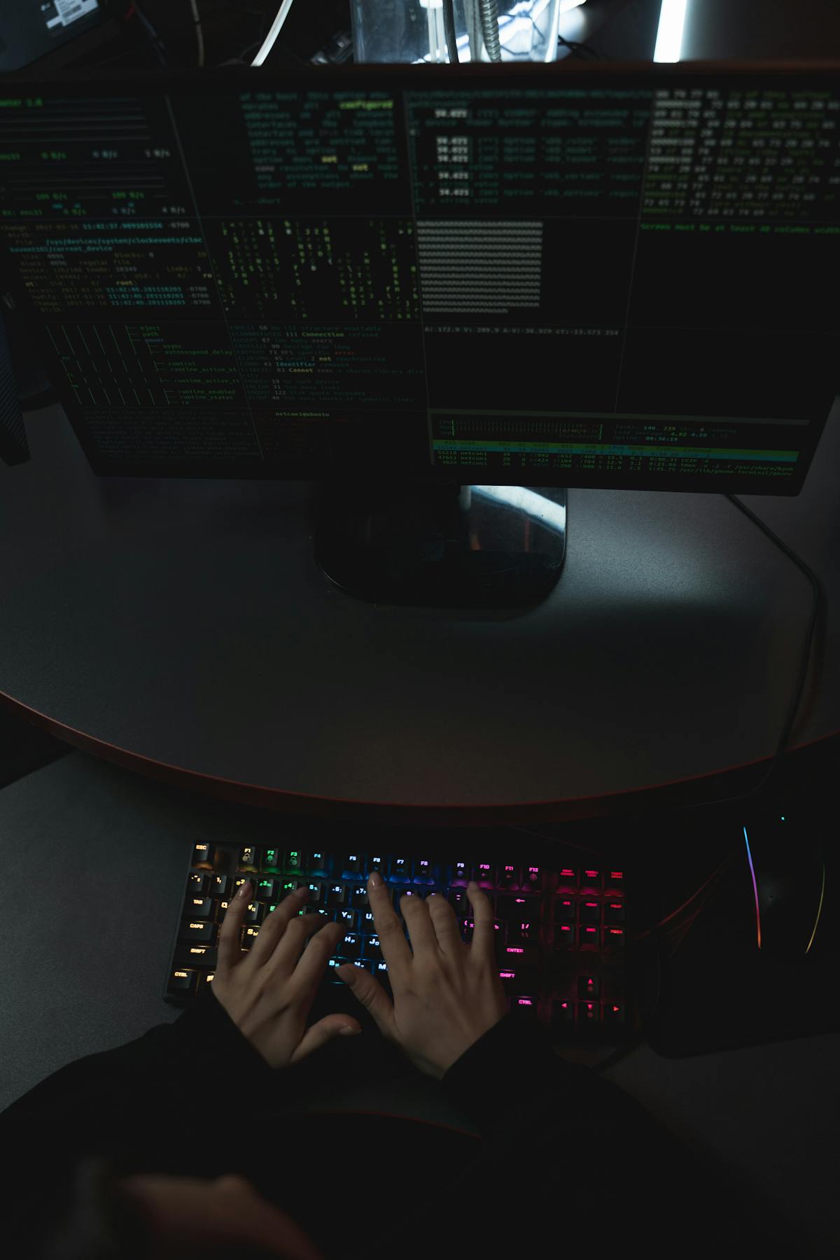Hands working on a laptop during a digital exposure review and cyber risk assessment.